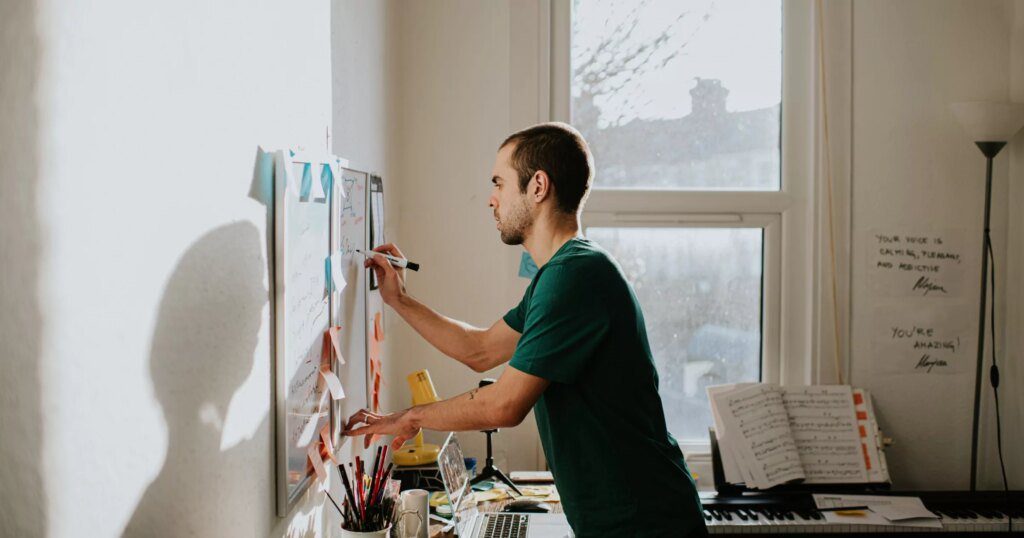 bertowritesonwhiteboard 2.blog lead space 40x21 1