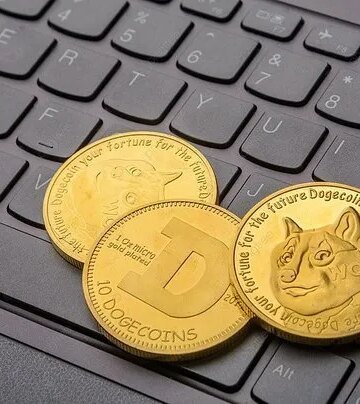 Dogecoin Remains Inside Falling Channel, Bulls Target Surge Above $0.1