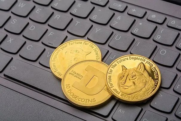 Dogecoin Remains Inside Falling Channel, Bulls Target Surge Above alt=